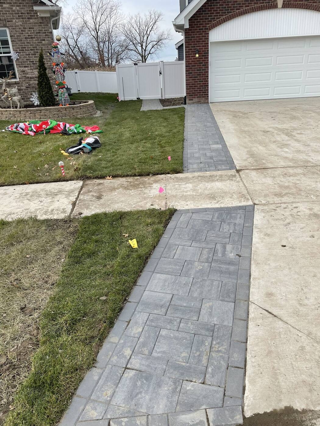 Paver walkways off the driveway