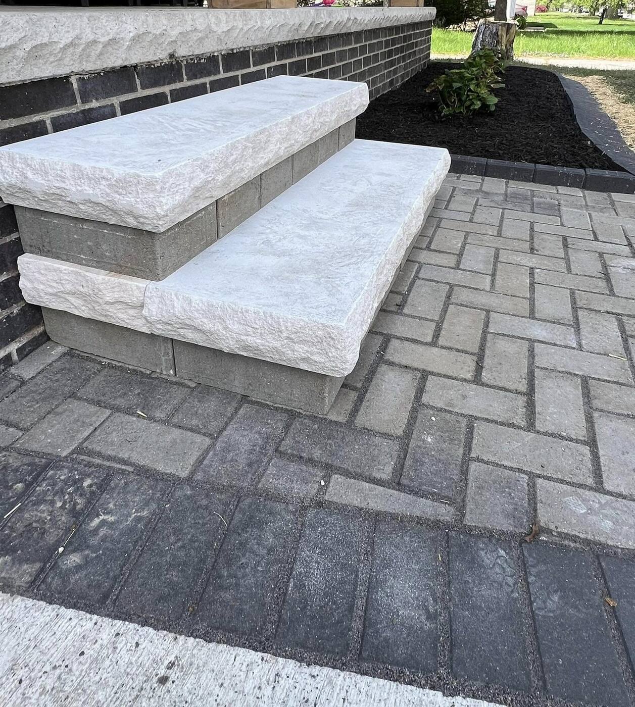 Limestone steps and paver landing