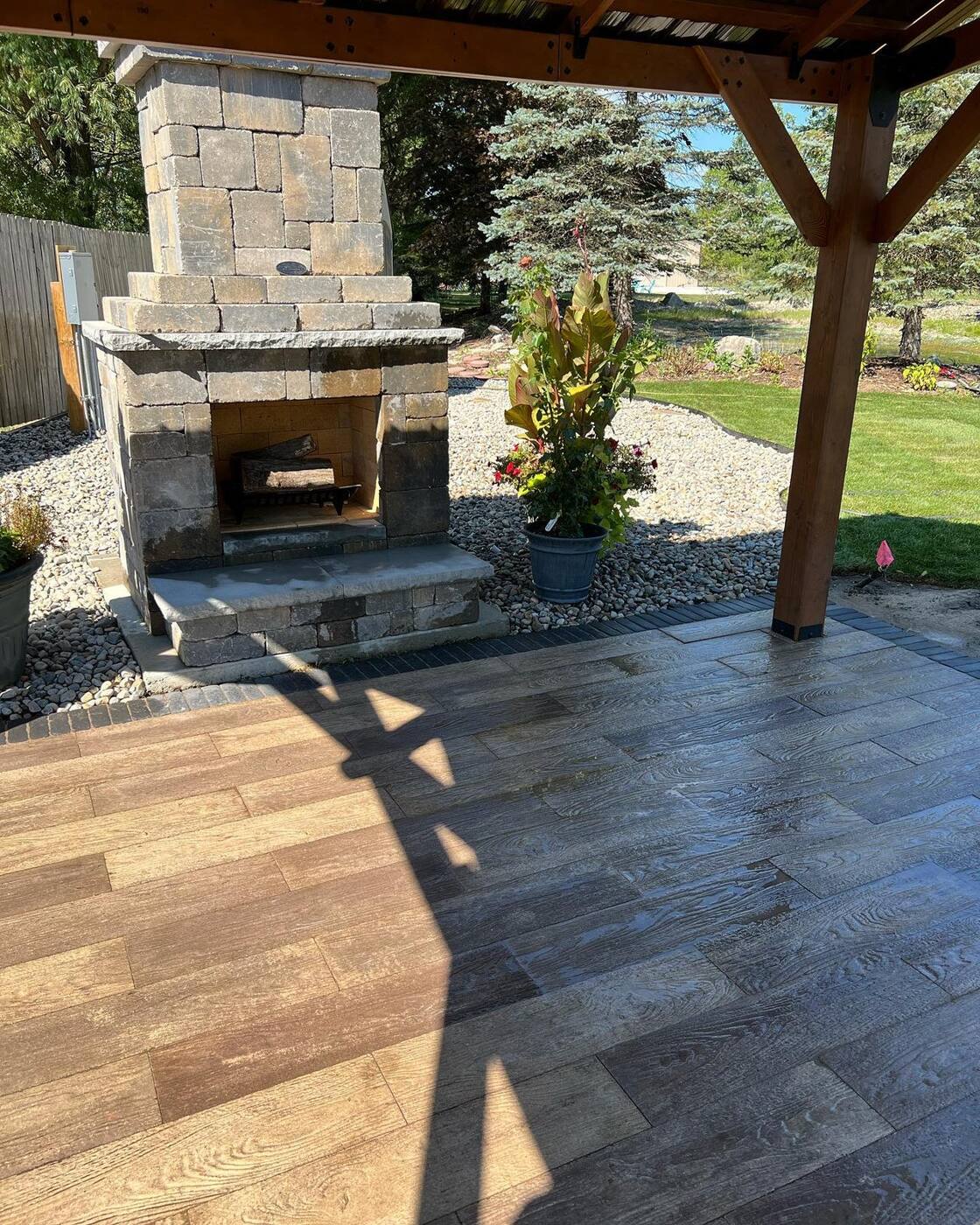 Outdoor fireplace under the pavilion
