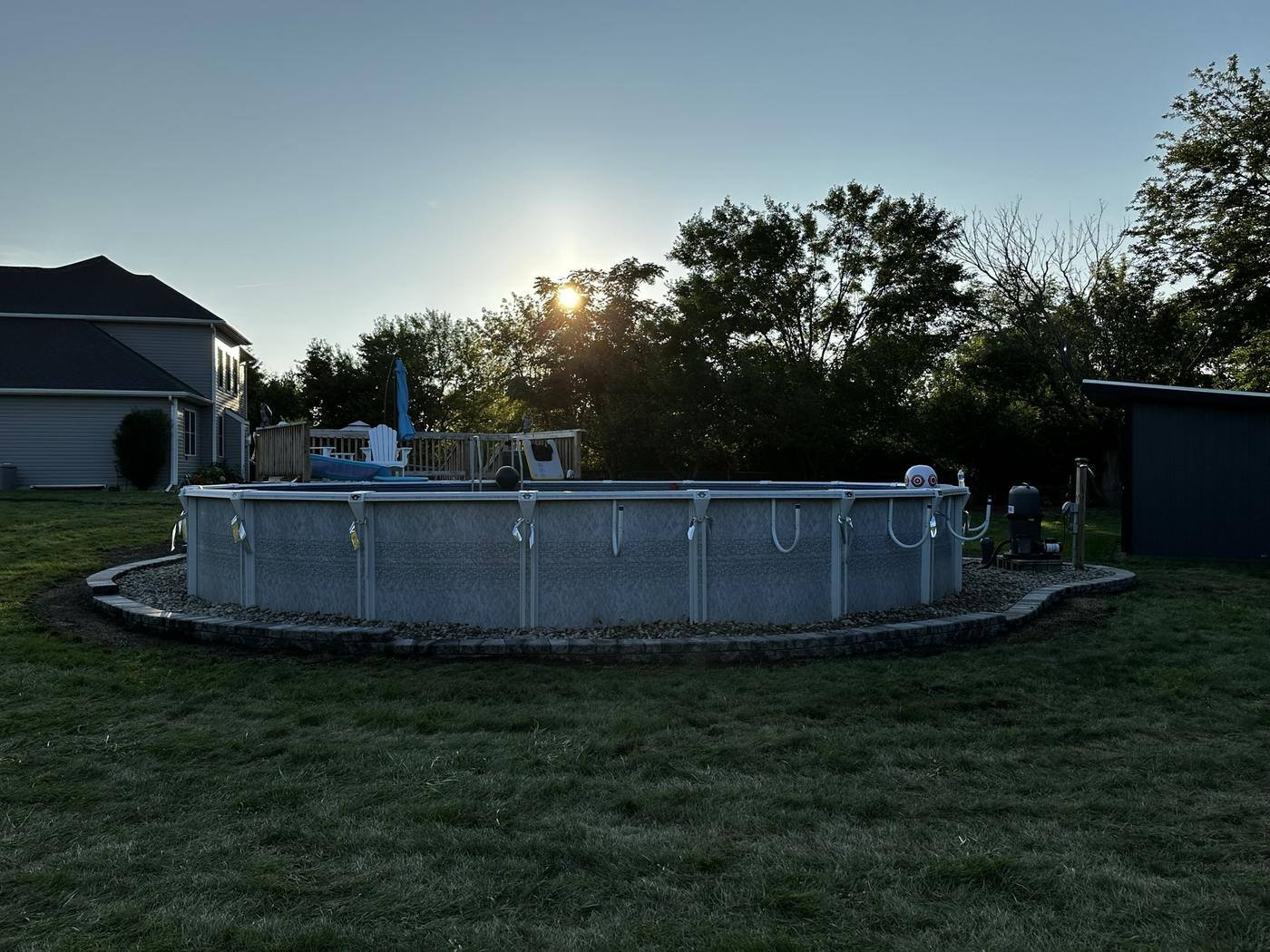 Pool surround wall and patio