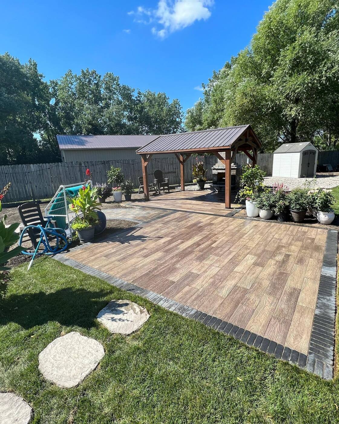 Wood-look paver patio with pavilion